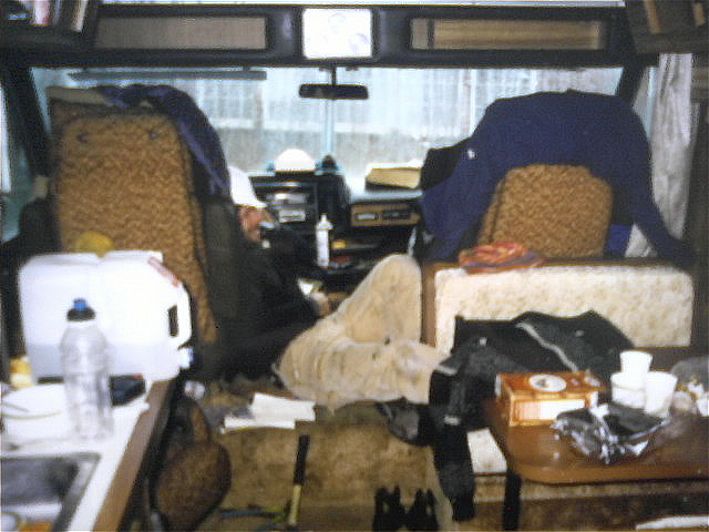 Photo of Me on the cell phone in Dick Metcalf’s donated motor home at Highland Park Elementary in Seattle