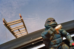 Mold fighting ninja turtle with Tabasco bottle strapped to the grill of a HandsOn truck - Click for a larger image